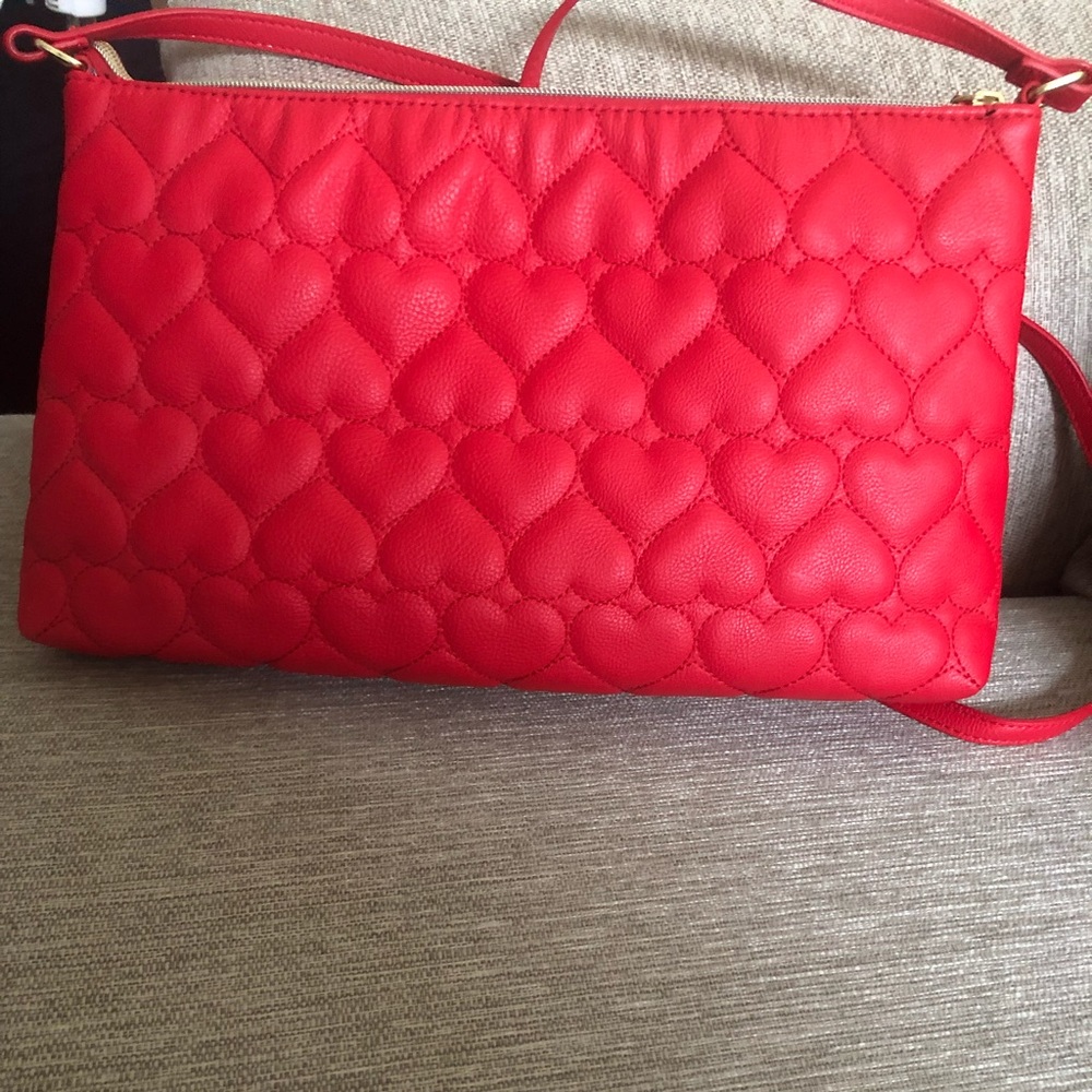 NEVER USED. red betsy Johnson purse